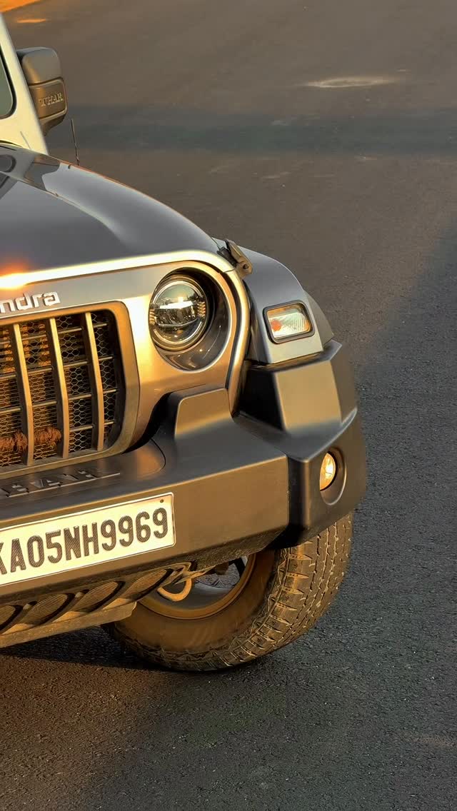 Front of a Mahindra Thar at golden hour