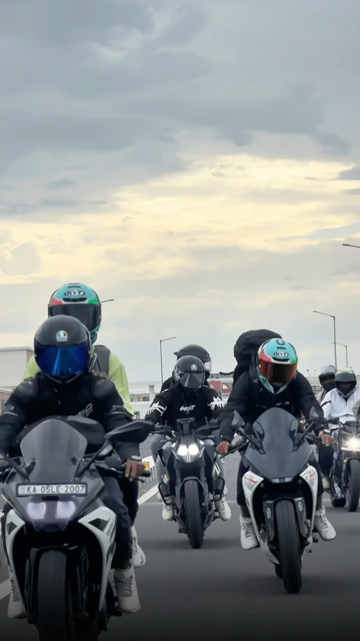 Pack of sportbikes riding head-on down a flyover